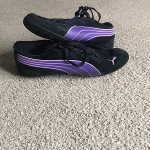 Black and purple puma sneakers